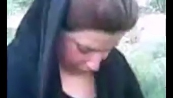Arab Hijab-Wearing Woman Indulges In Outdoor Sex